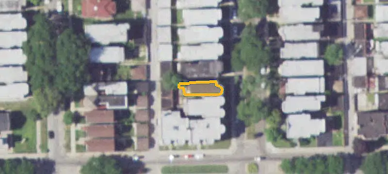 Brick Triplex With Detached Garage