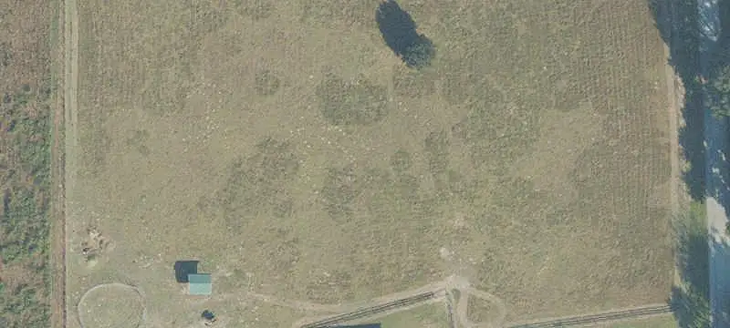 Fenced Agricultural Land with Pole Barns