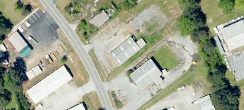 Fenced Auto Shop Building