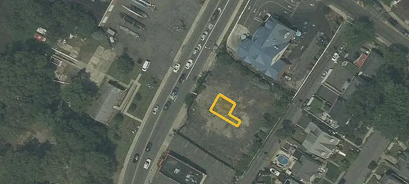 Commercial Land with Gutted Building