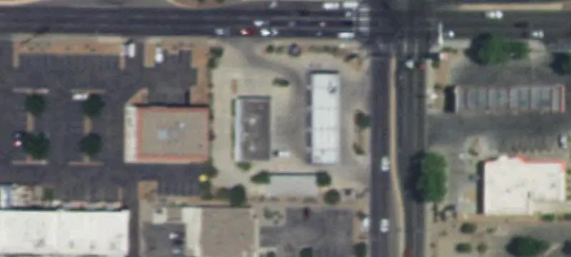 Signalized Commercial Land with Improvements
