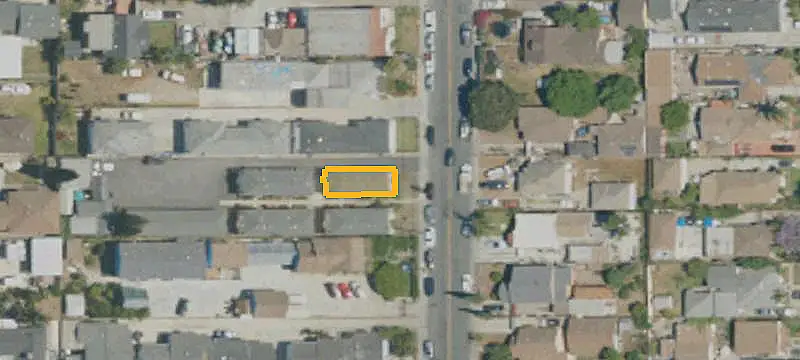 Nine-Unit Apartment Building with Carports