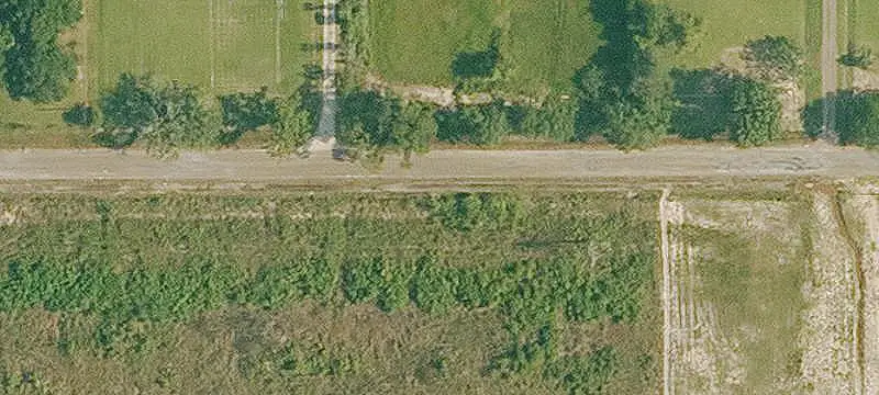 Agricultural Land with Pond and Outbuildings
