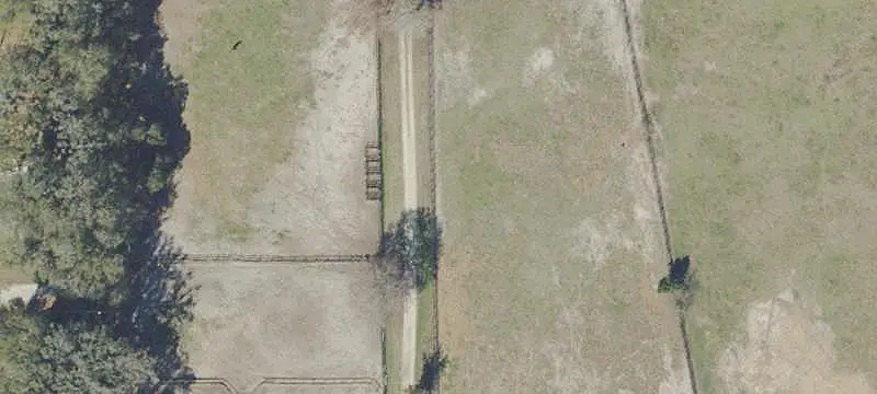 Horse Farm with Center-Aisle Barn