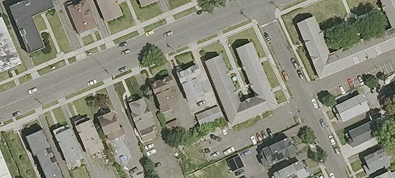 Brick Triplex with Four-Car Garage