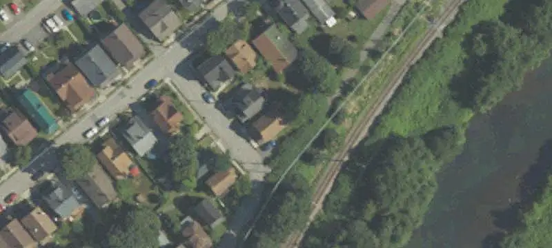 Occupied Duplex with Off-Street Parking