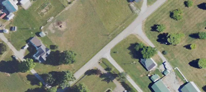 Farmland with Lake and Barn