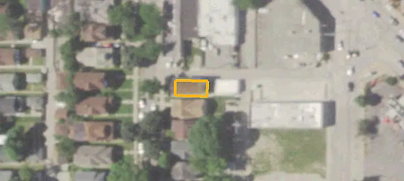 Duplex With Three-Car Garage