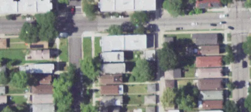 Updated Triplex with Brick Garage