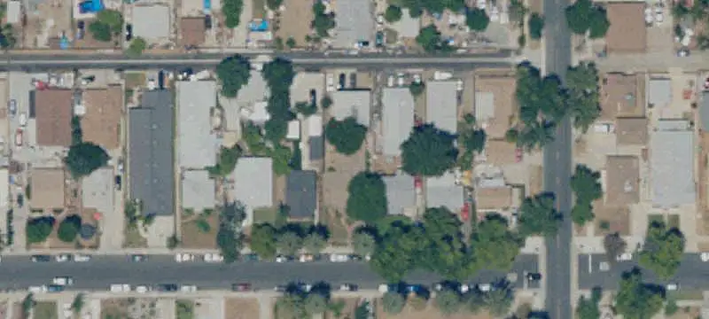 Triplex With Detached Garages
