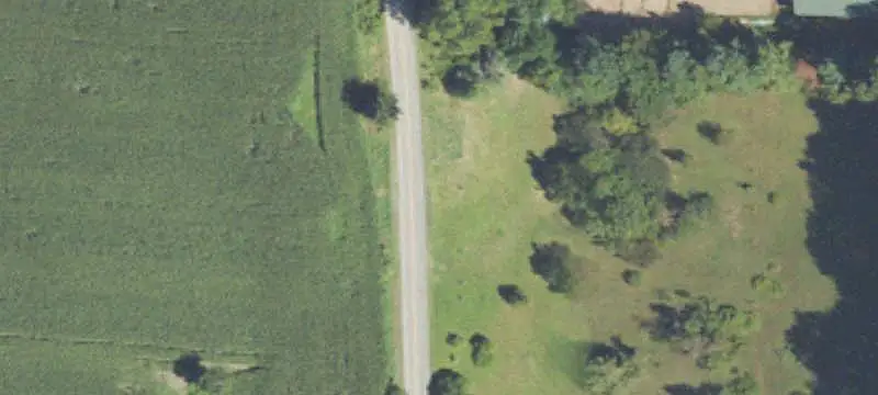 Wooded Land with Detached Garage