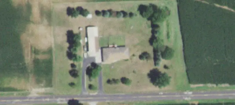 Warehouse Building With Fenced Yard