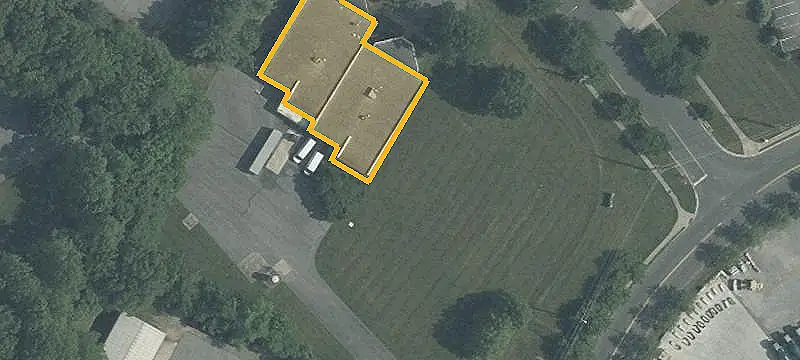 Commercial Land with Brick Improvements