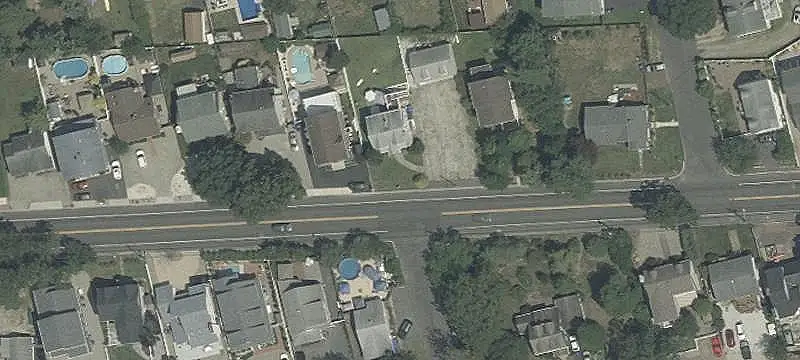 Duplex With Three-Car Garage