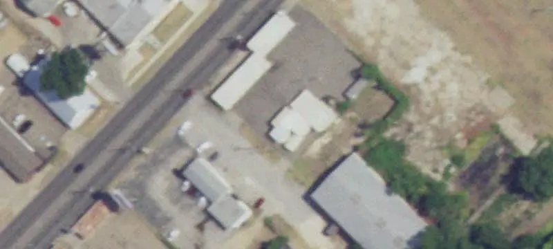Commercial Land with Covered Improvements