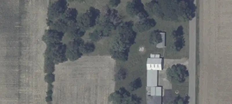 Agricultural Farmland With Farmhouse