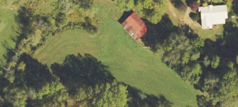 Riverfront Farm with Mountain Views