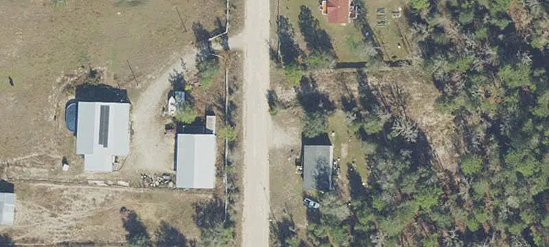 Fenced Farm with Horse Barn