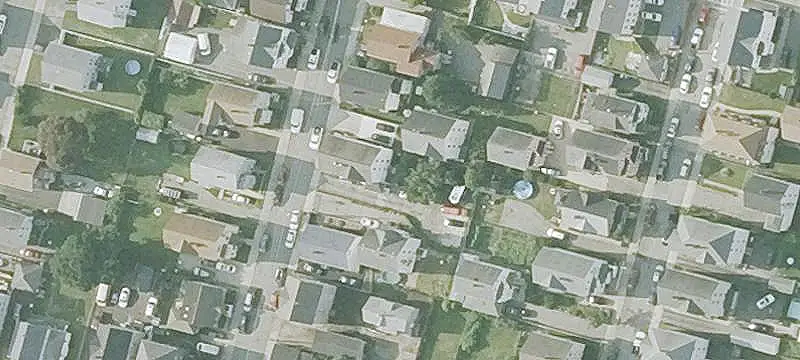 Updated Triplex with Off-Street Parking