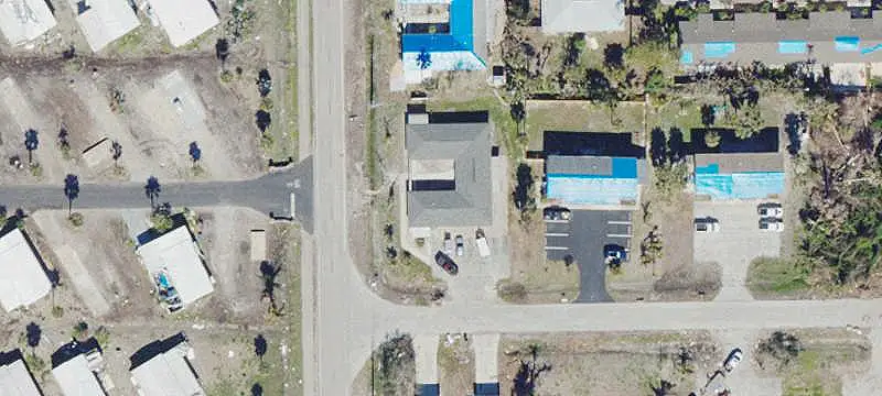 Four-Unit Quadplex with Screened Lanais