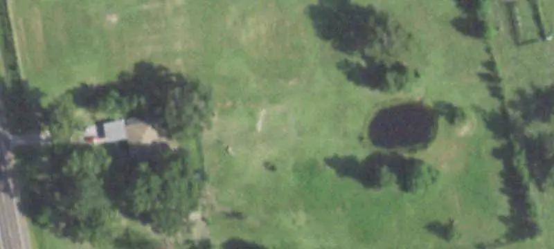Fenced Farm Property with Metal Building
