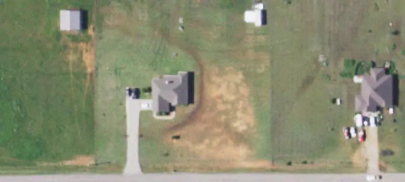 Fenced Agricultural Land With Barn