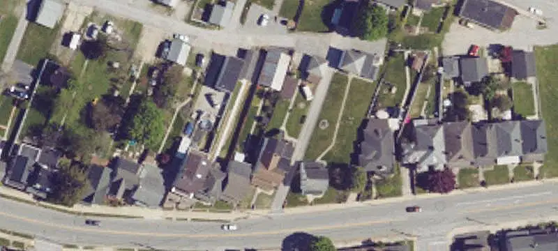 Duplex With Detached Outbuildings