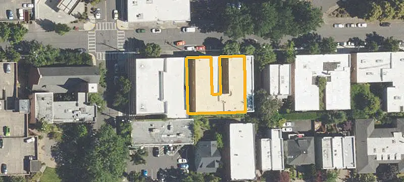 Vintage Apartment Building with Commercial Garage
