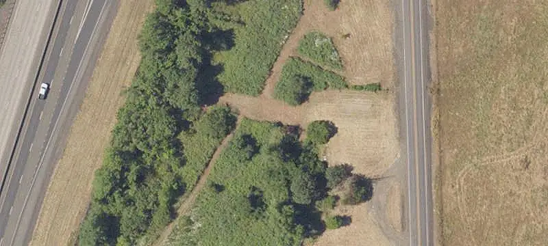 Bare Farmland with Seasonal Creek