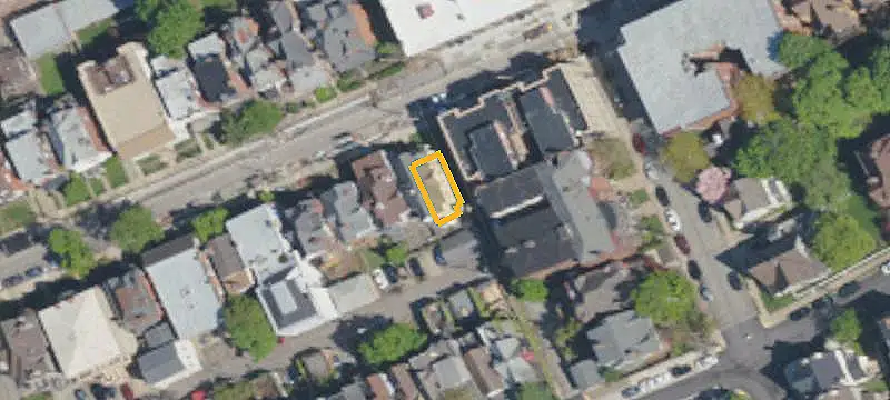 Brick Duplex With Detached Garage