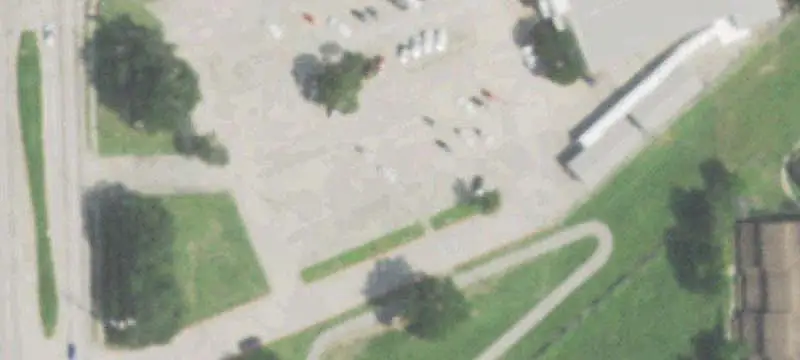 School Building With Auxiliary Structures