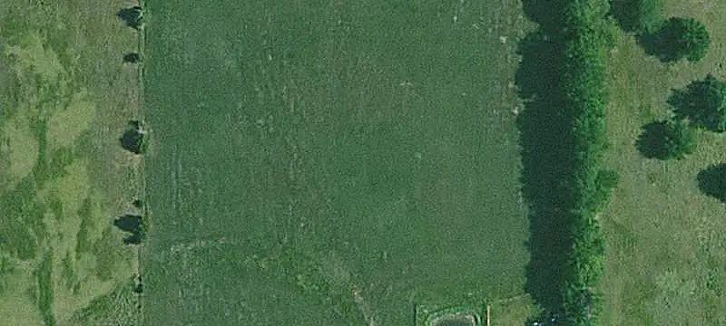 Fenced Horse Property with Barns