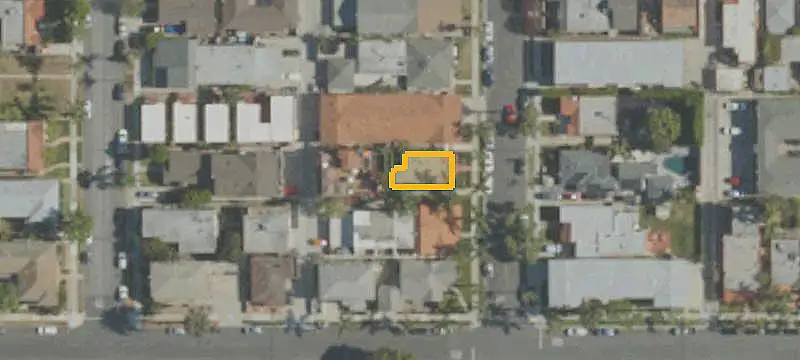 Spanish-Style Triplex with Rooftop Deck