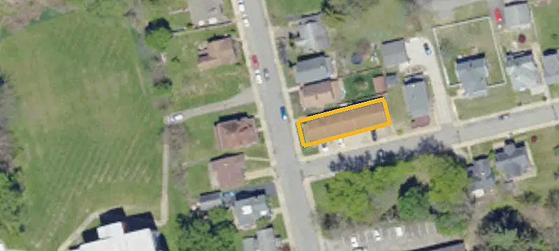 Updated Triplex With Detached Garage