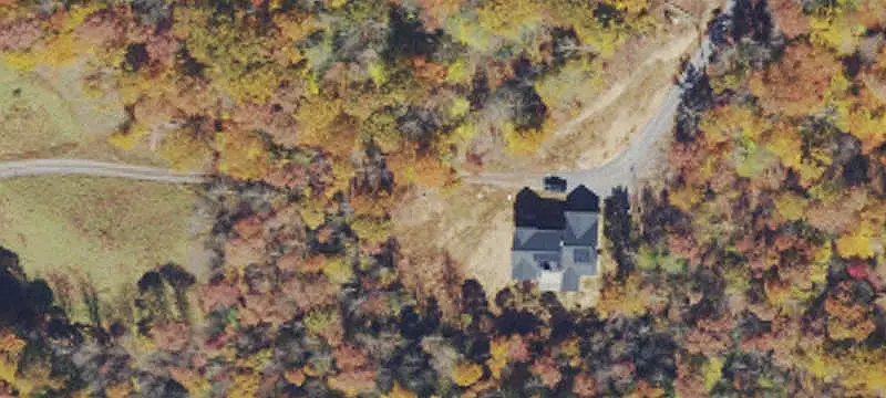 Wooded Land with Water Frontage