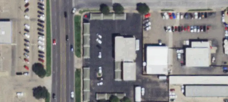 Automotive Showroom with Three-Bay Shop