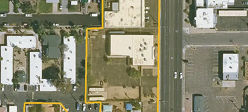 Mixed-Use Property with Paved Yard