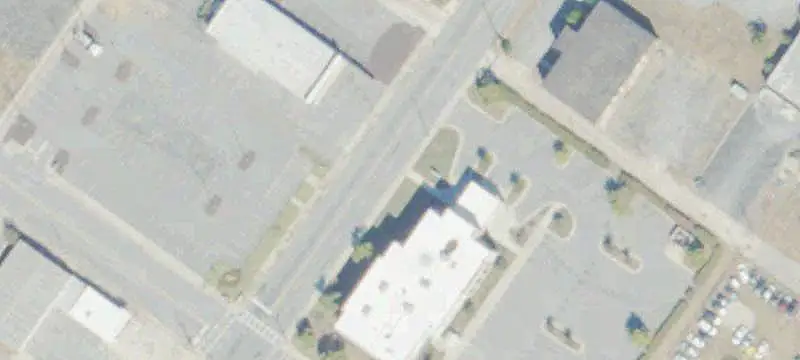 Commercial Land with Existing Buildings