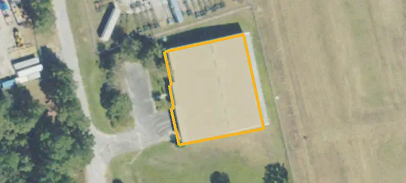 Industrial Warehouse with Rocked Yard