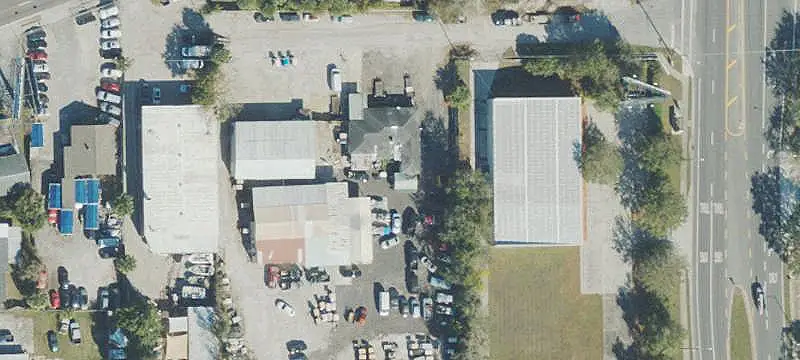 Fenced Industrial Property with Buildings