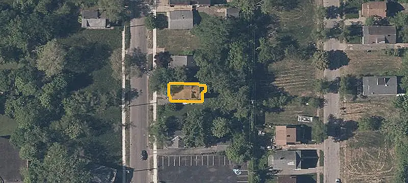 Brick Triplex Requiring Renovation
