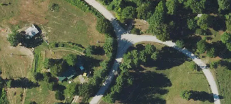 Wooded Land with Cleared House Seat