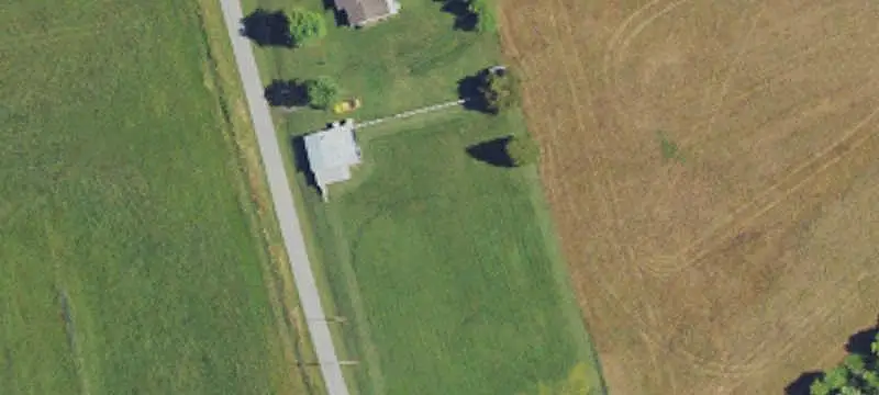 Fenced Farmland With Homestead