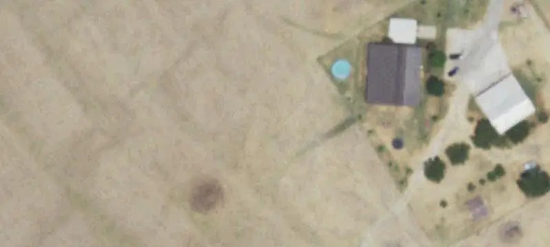 Farmland With Farmhouse