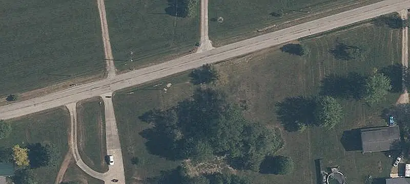 Wooded Land with Gravel Driveway