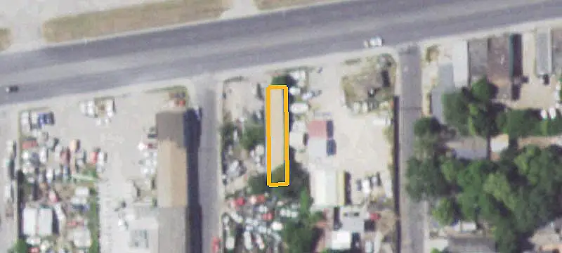 Fenced Auto Shop Building