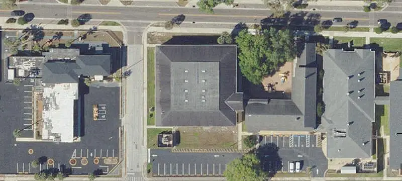 School Building with Basketball Court