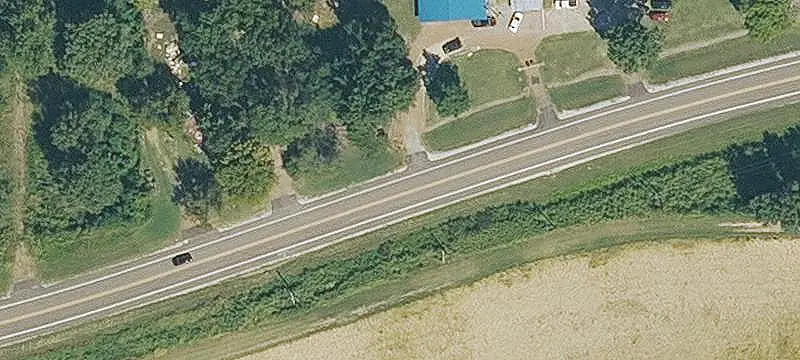 606-Acre Farm with Lakefront Access