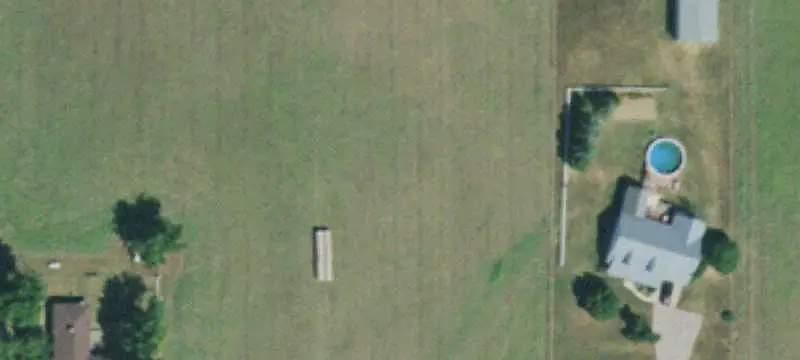 Cross-Fenced Farm with Equipment Shed