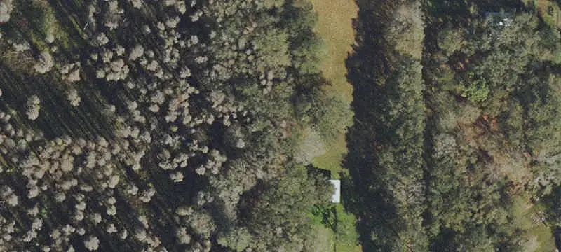 Fenced Agricultural Land with Pond